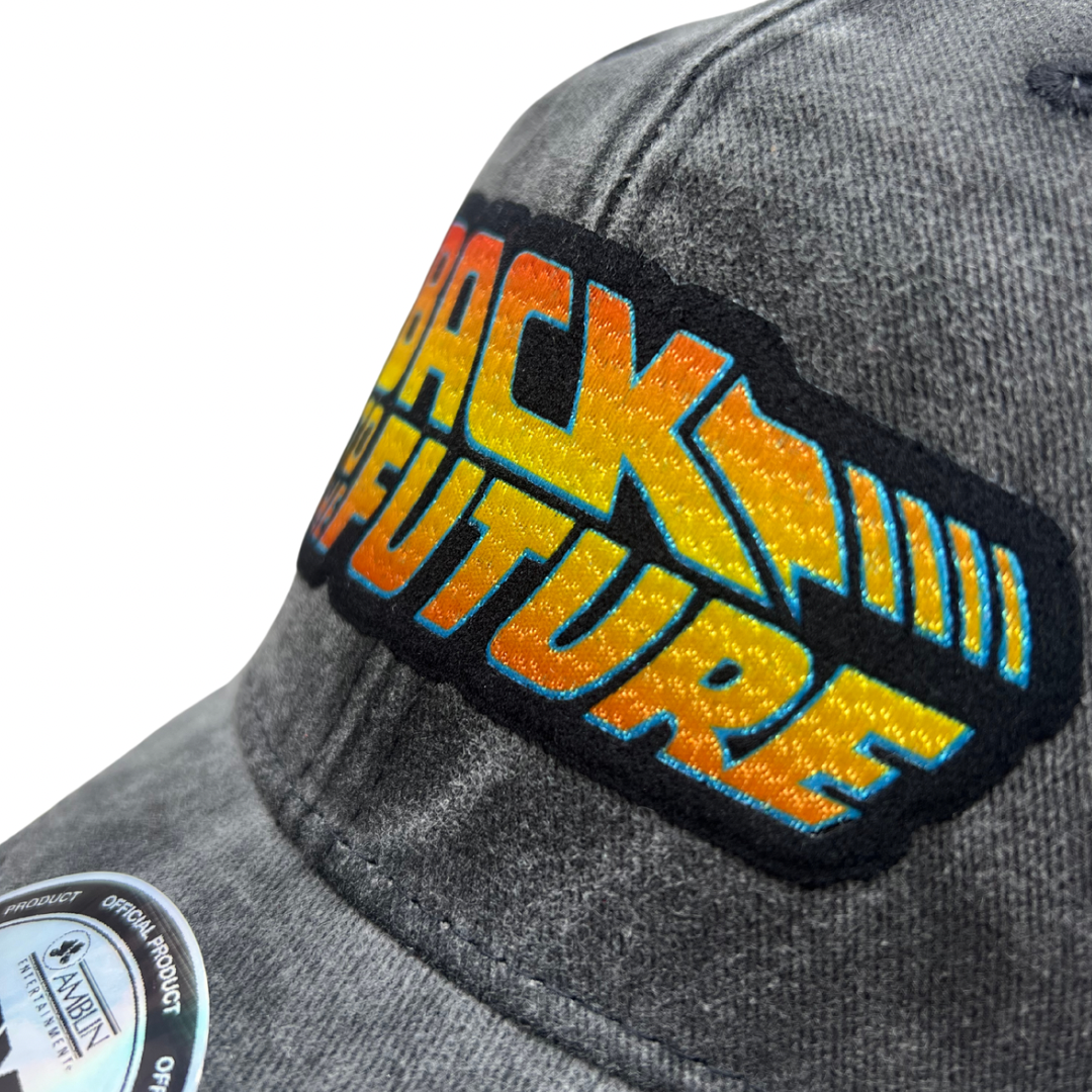 Gorra Back to the Future Logo Clásico Gris/Blanca Tipo Trucker Deslavada