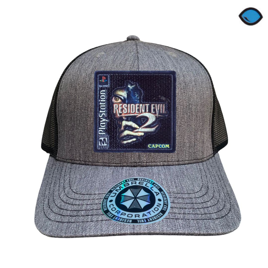 Gorra Resident Evil 2 Game Cover Gris/Negra Tipo Trucker Premium