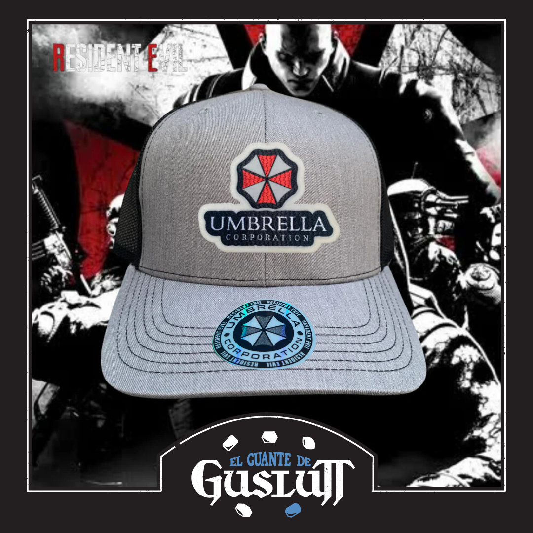 Gorra Resident Evil Umbrella Corporation Gris/Negra Tipo Trucker Premium