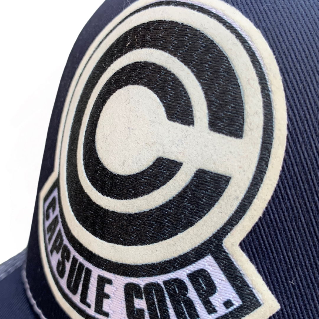Gorra Dragon Ball Super “Capsule Corp Logo” Azul-Blanca Premium Trucker
