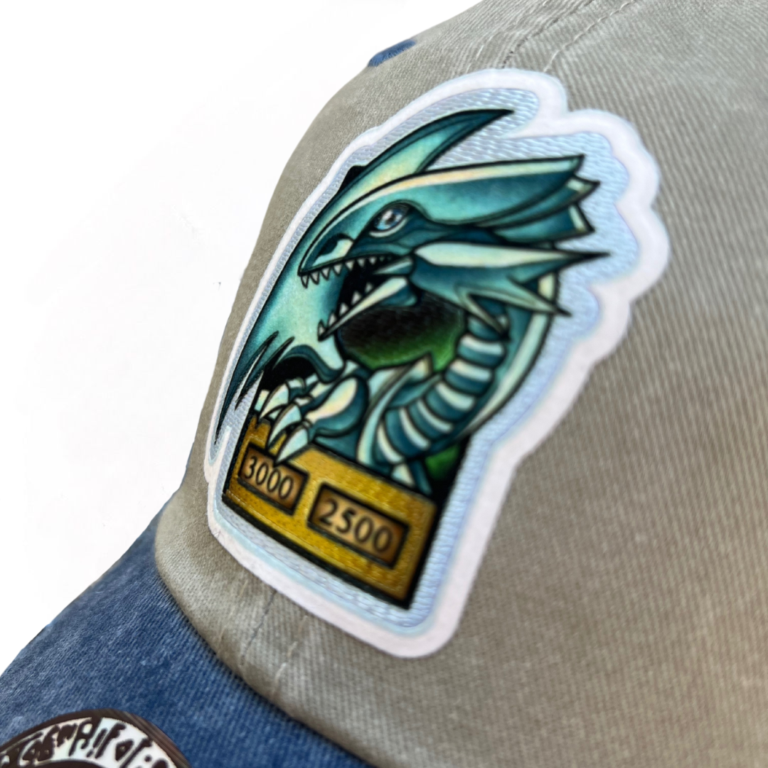 Gorra Yu-Gi-Oh! Dragón Blanco de Ojos Azules Beige/Azul Tipo Deslavada