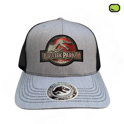 Gorra Jurassic Park III Logo Clásico Gris/Negro Tipo Trucker Premium