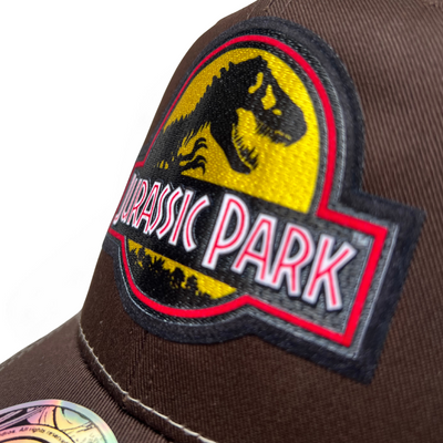 Gorra Jurassic Park Logo Clásico Amarillo Café/Blanca Tipo Trucker Premium