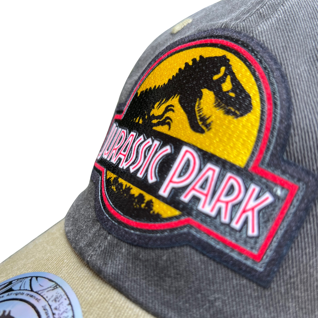 Gorra Jurassic Park Logo Clásico Amarillo Gris/Beige Tipo Deslavada